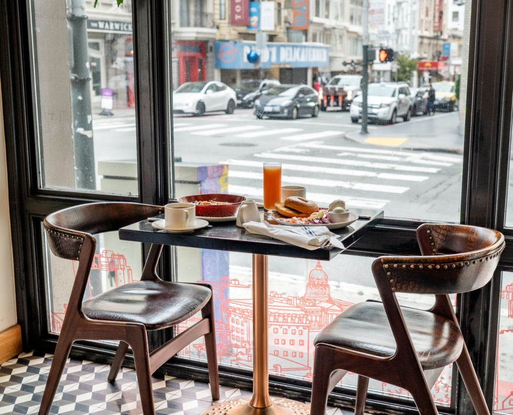 Breakfast at a tabl in front of window at marker union square in san francisco