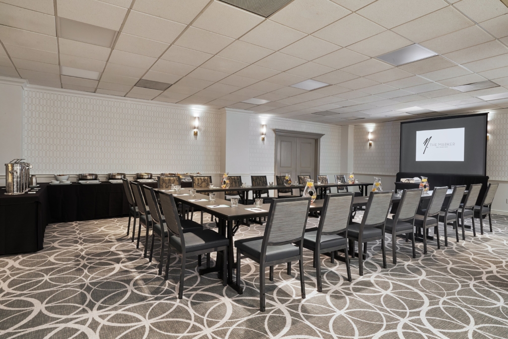 spade meeting room at the marker hotel with conference tables and chairs set up