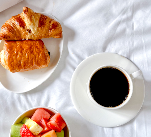 close up of food sitting on a bed at the marker