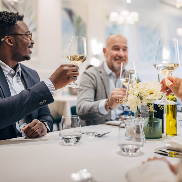 people toasting to a special occasion at the marker