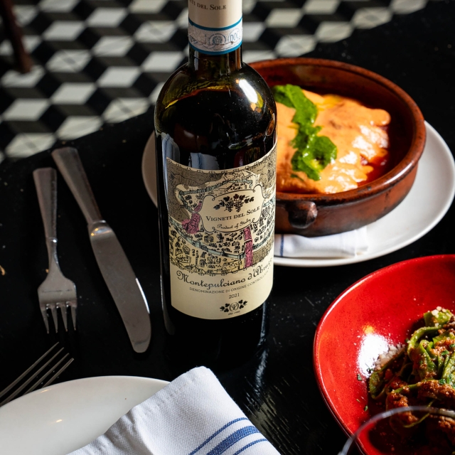 close up of a bottle of wine from tratto