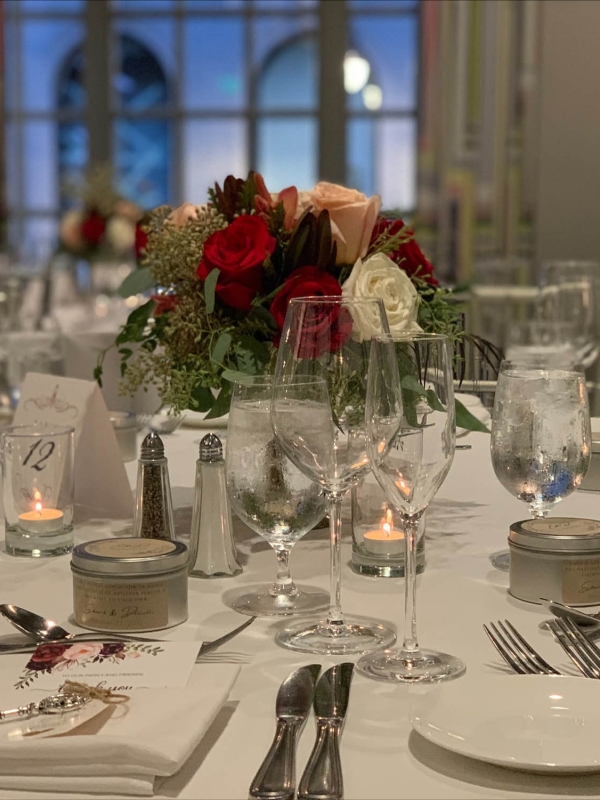 Close up of glass wear and cutlery sitting on a table