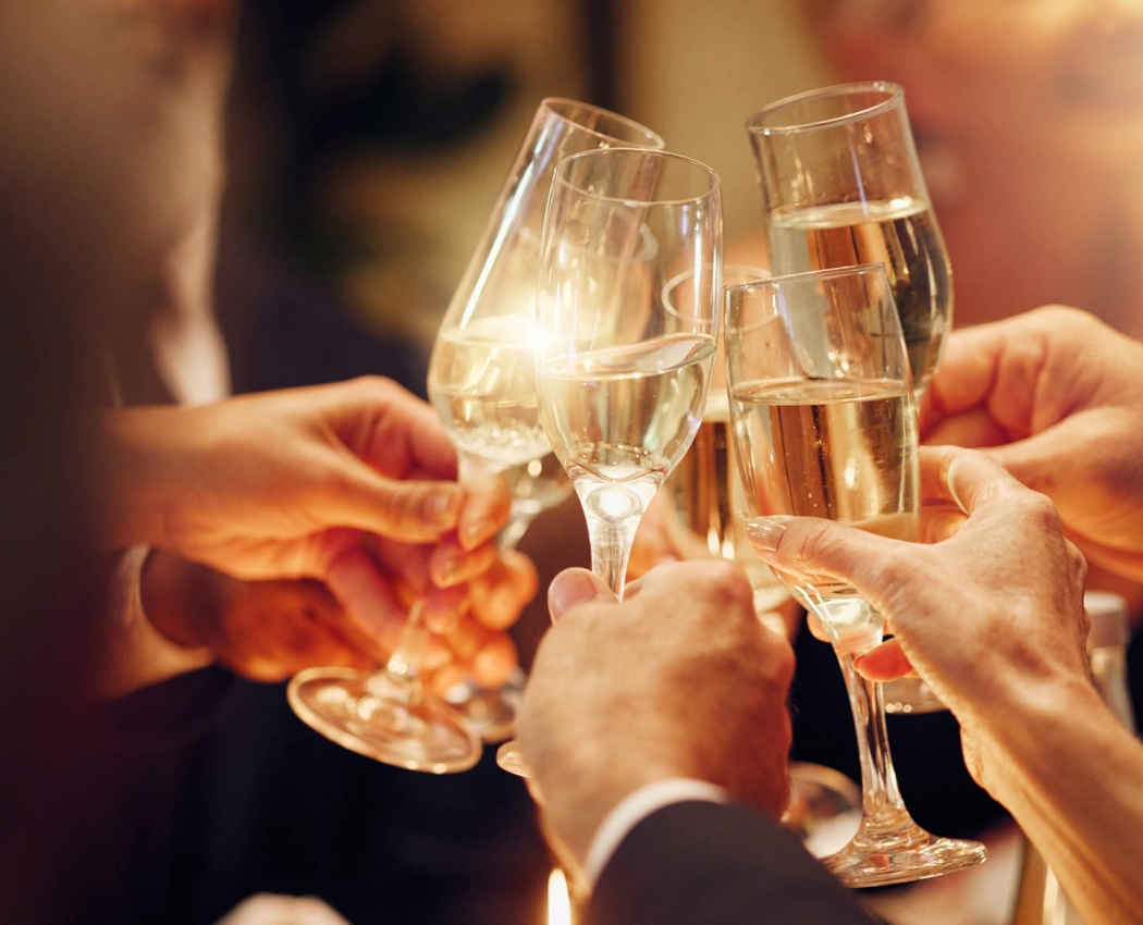 A close up of people enjoying drinks