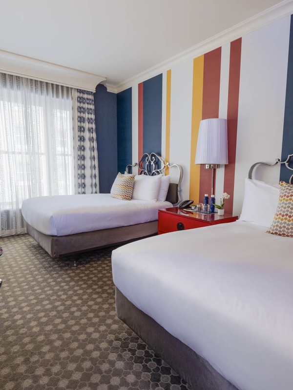 Large bedroom with two beds at The Marker