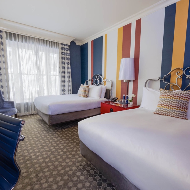 Large bedroom with two beds at The Marker