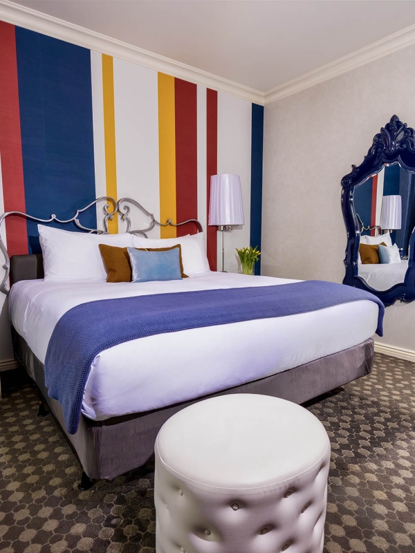 Side view of a large bed in a bedroom at The Marker